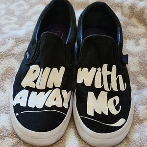 Vans Black and White Slip-On Sneakers
